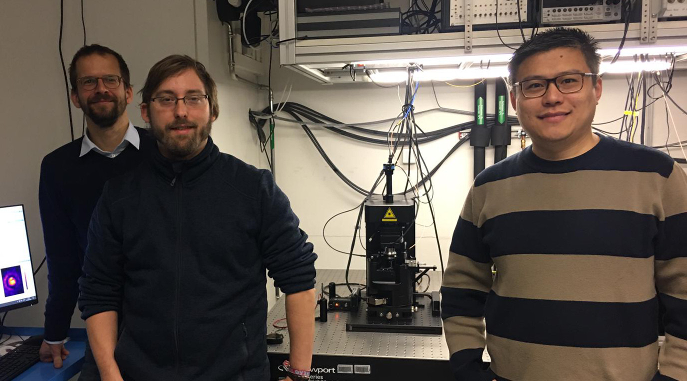 Prof. Patrick Maletinsky, Dr Kai Wagner and Dr Hai Zhong in the Qnami lab with the first ProteusQ microscope