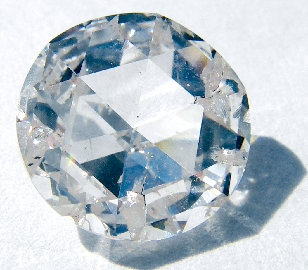 A manufactured diamond with an NV center that is used in Scanning NV magnetometry