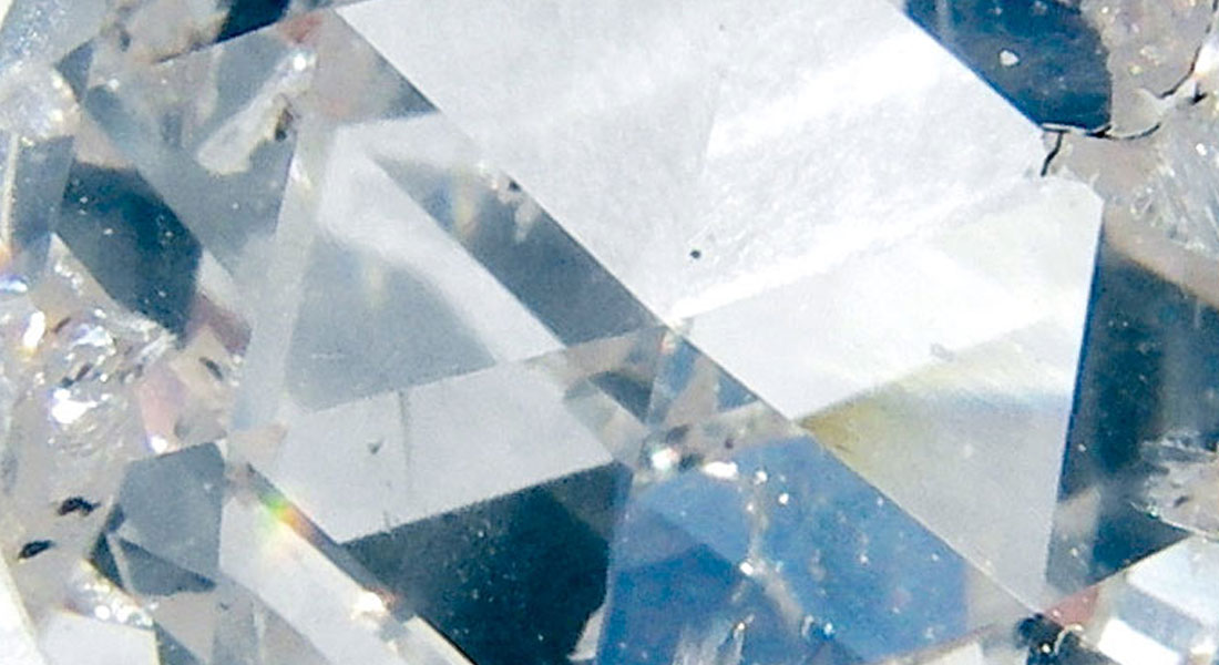 Close-up of a manufactured diamond with an NV center that is used in Scanning NV magnetometry